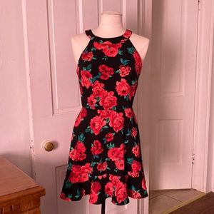 Size 9 A. Byer dress in black with red florals.